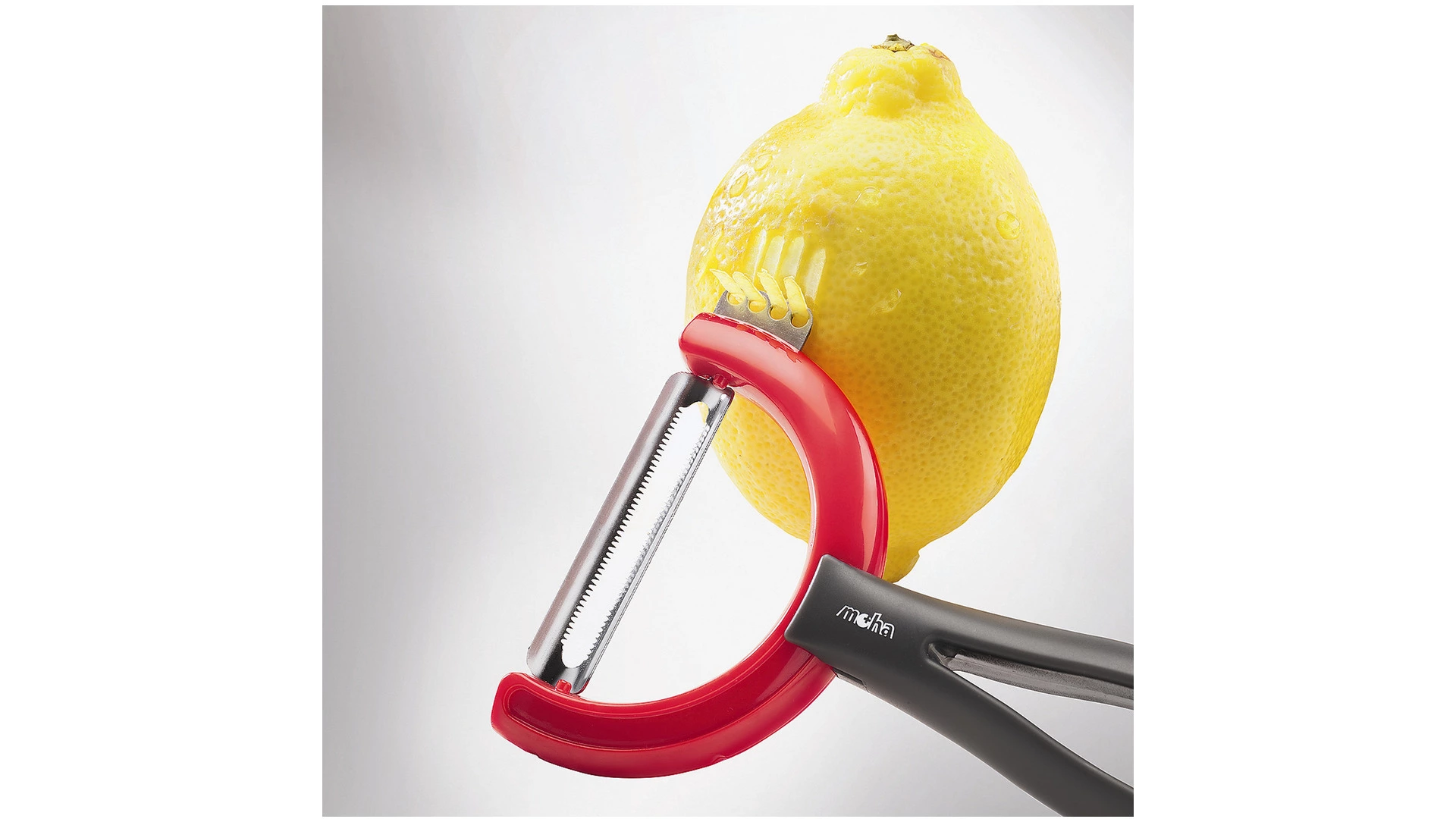 Овощечистка с поворотным лезвием с зубчиками MoHa REVERSO FRUIT, красная