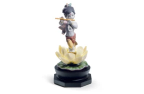 Фигурка Lladro Гопала Кришна на лотосе 12х24 см, фарфор